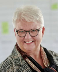 Portræt af Gitte Fiirgaard, chef for HR, Filadelfia